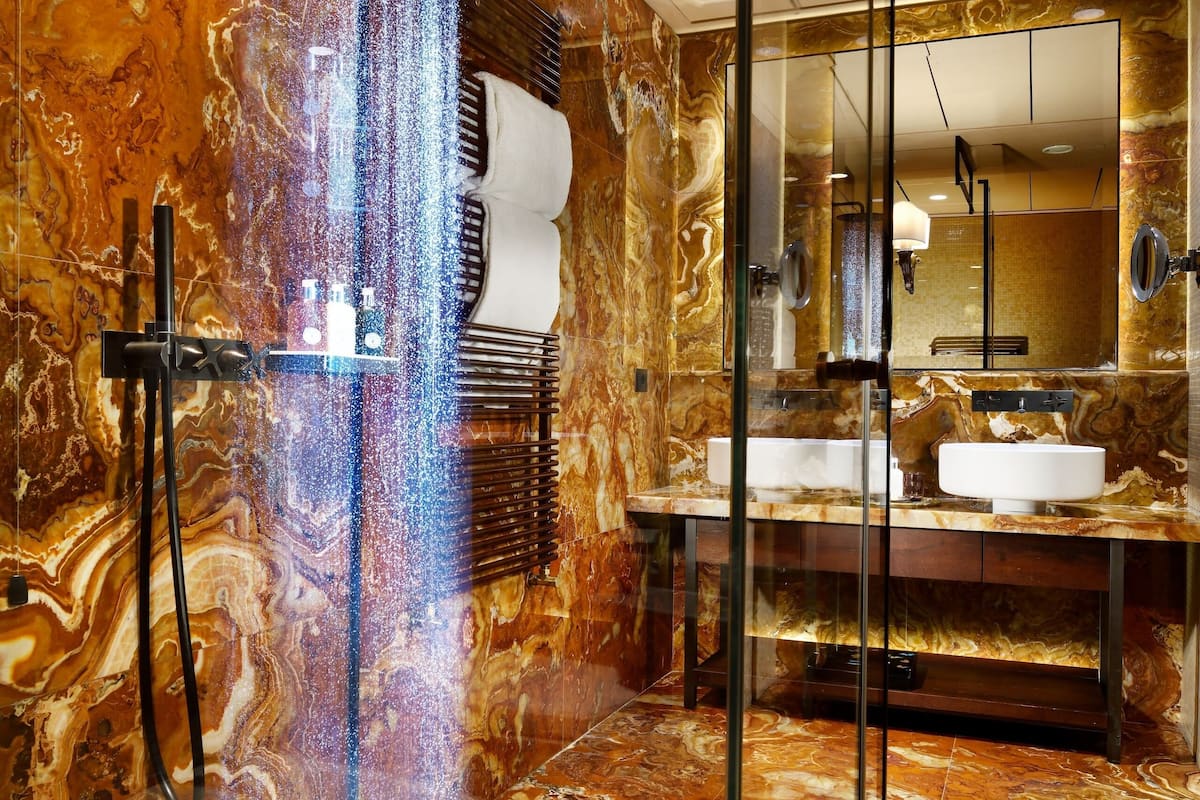 suite | bathroom | shower, designer toiletries, hair dryer, bathrobes