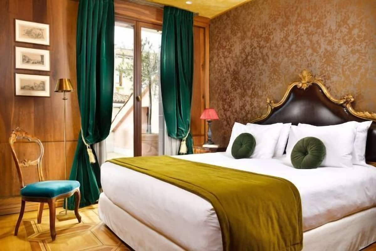 2 habitaciones, ropa de cama de alta calidad y minibar