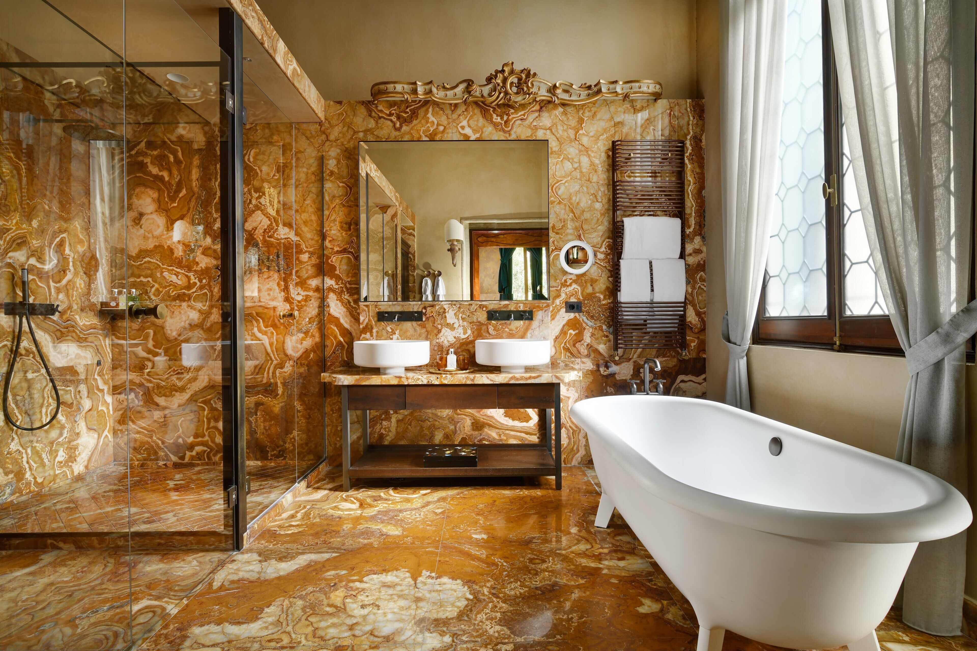 luxury suite | bathroom | shower, designer toiletries, hair dryer, bathrobes