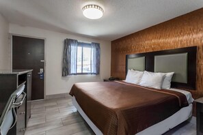 Room, 1 King Bed, Smoking | Desk, blackout drapes, iron/ironing board, free WiFi