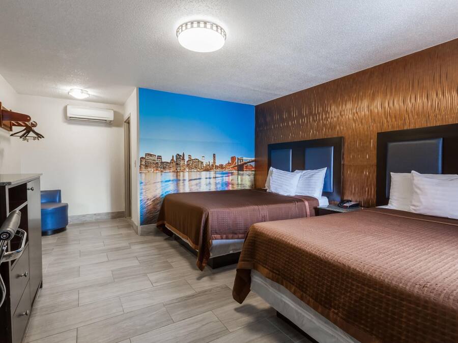 Room, 2 Queen Beds, Non Smoking | Desk, blackout curtains, iron/ironing board, free WiFi