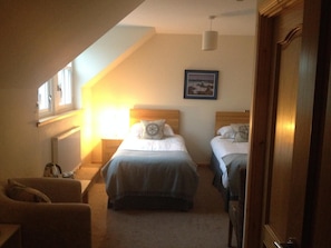 Premium bedding, desk, iron/ironing board, free WiFi
