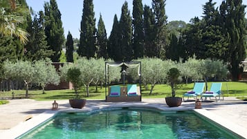 Outdoor pool, pool umbrellas, pool loungers