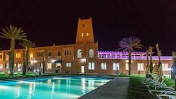 Indoor pool, outdoor pool, pool umbrellas, sun loungers