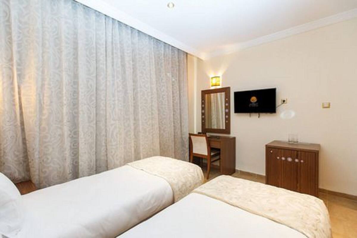 Standard Double Room | Minibar (free items), in-room safe, desk, blackout drapes