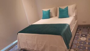 Premium bedding, in-room safe, individually decorated