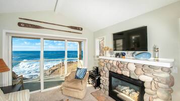 Condo, 1 Bedroom, 1 Bathroom, Ocean View (Seacliff Loft) | Living area | Flat-screen TV, fireplace, DVD player