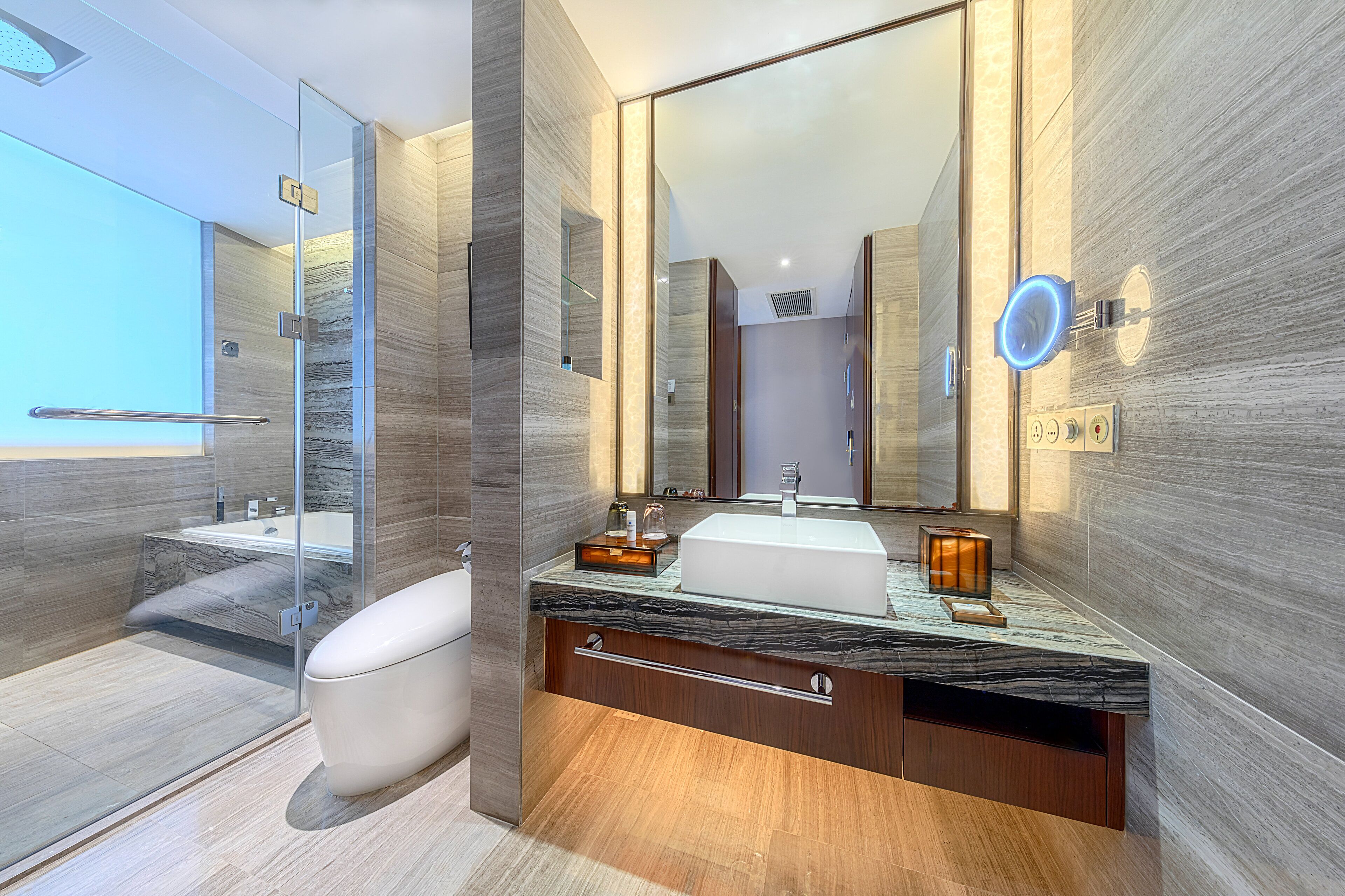 separate bathtub and shower, designer toiletries, hair dryer, bathrobes