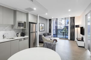 1 Bedroom Accessible Suite | Living area | Flat-screen TV