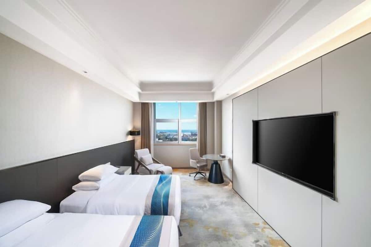Ropa de cama de alta calidad, minibar, caja fuerte y escritorio