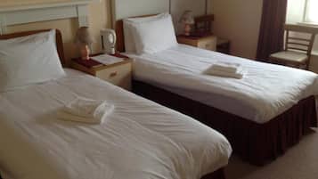 Tabla de planchar con plancha, camas extra, wifi gratis y ropa de cama