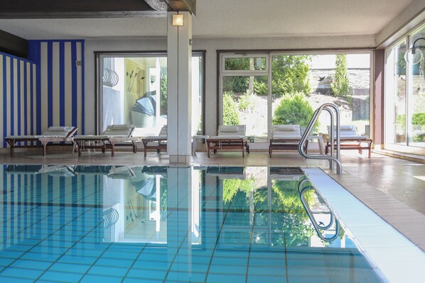 Indoor pool, open 7:00 AM to 9:00 PM, sun loungers