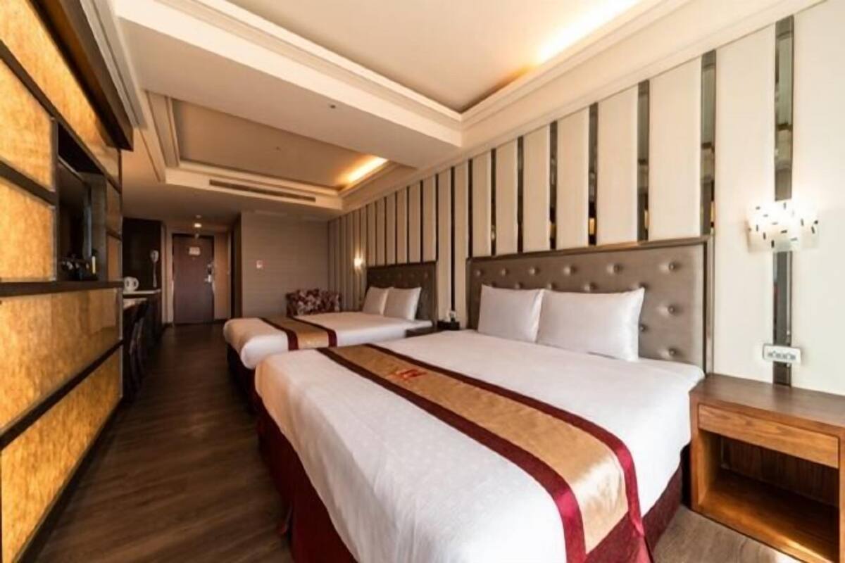 Premium bedding, desk, laptop workspace, blackout curtains