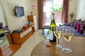 Suite, 1 Bedroom (Olimpus Garden 12) | Living area | Flat-screen TV, DVD player - Ayia Napa Olimpus Suites (Ayia Napa)