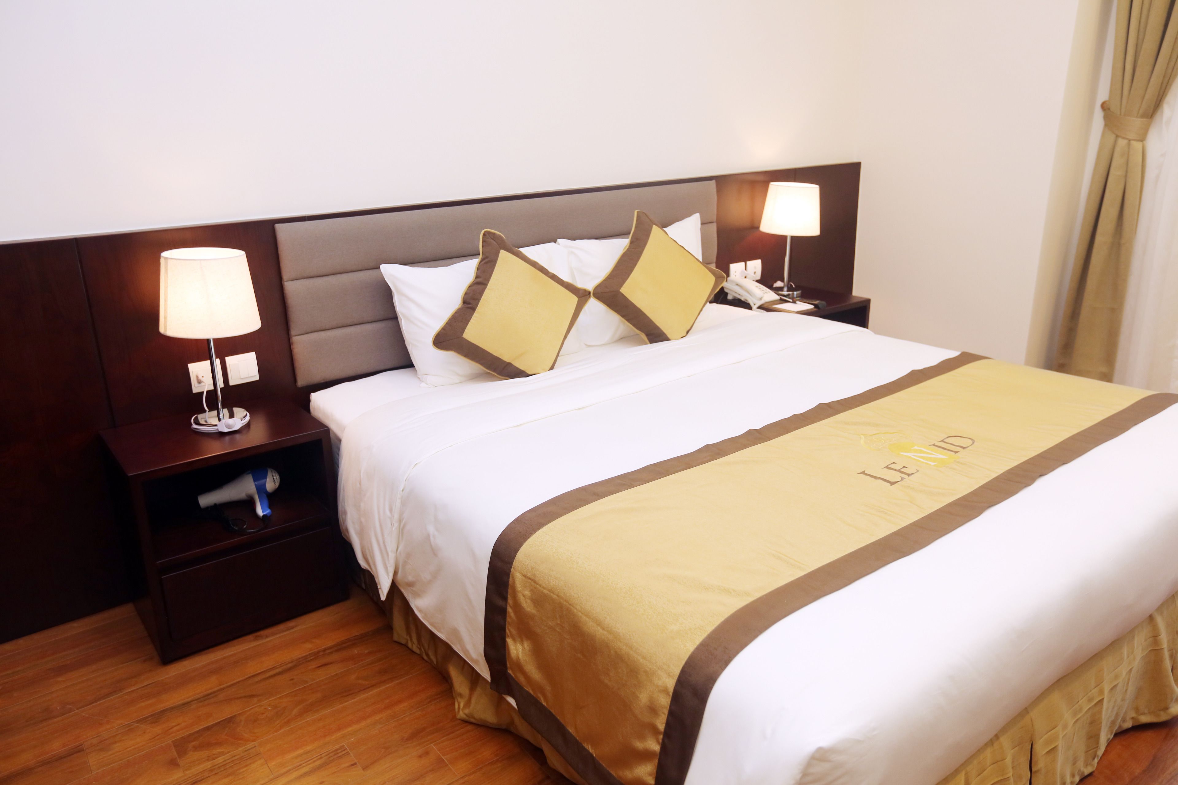 deluxe double with city view | minibar, in-room safe, desk, laptop workspace