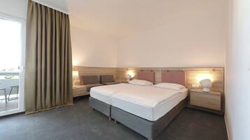 Comfort Double Room, Partial Sea View | Minibar, desk, iron/ironing board, free WiFi