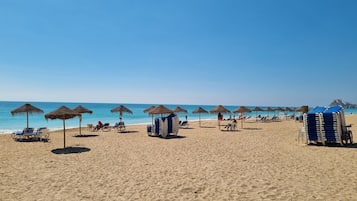 On the beach, white sand