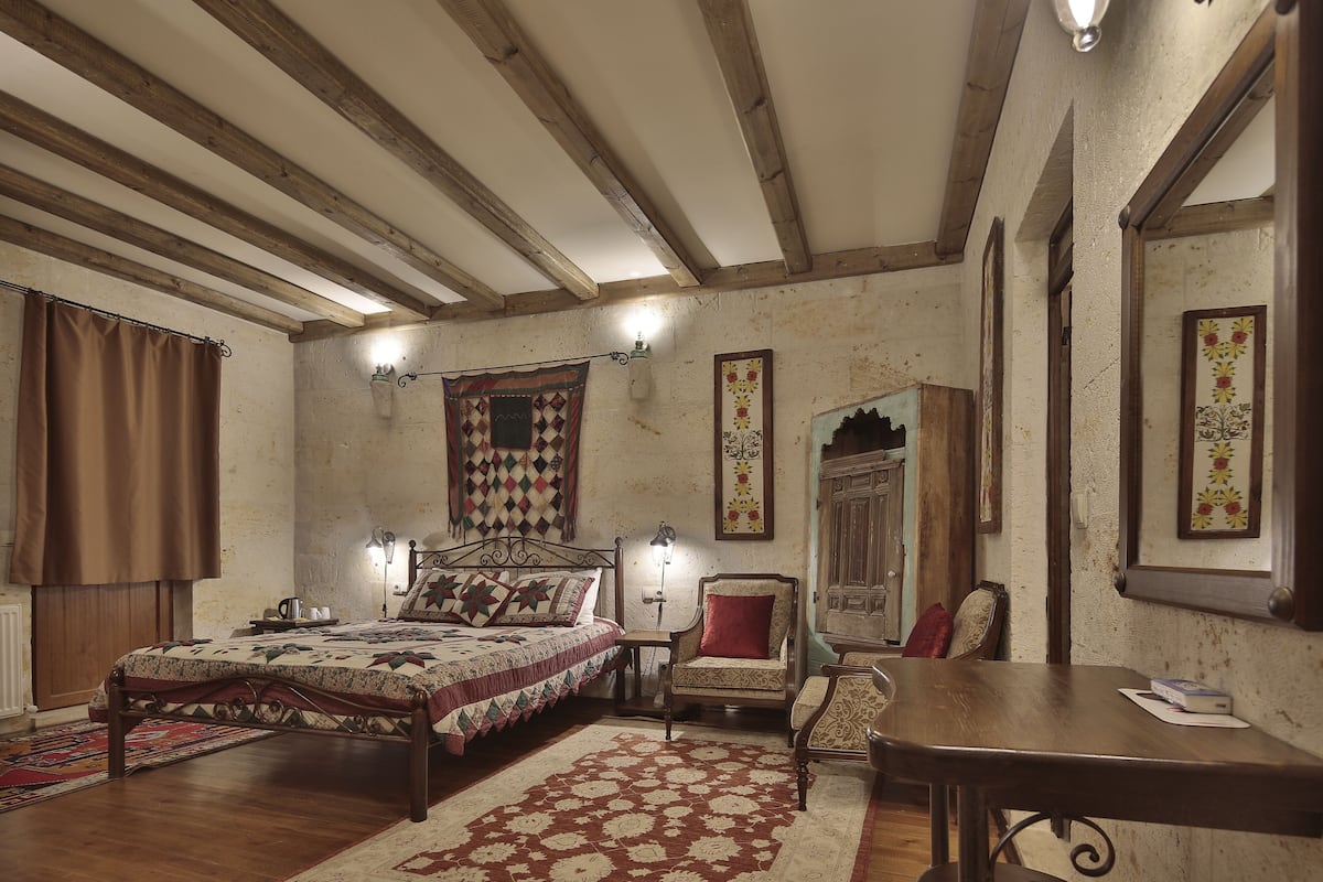 Deluxe Stone Room With Balcony | 1 bedroom, premium bedding, in-room safe, individually decorated