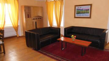 Apartment, 2 Bedrooms, Lake View | Living area | Flat-screen TV