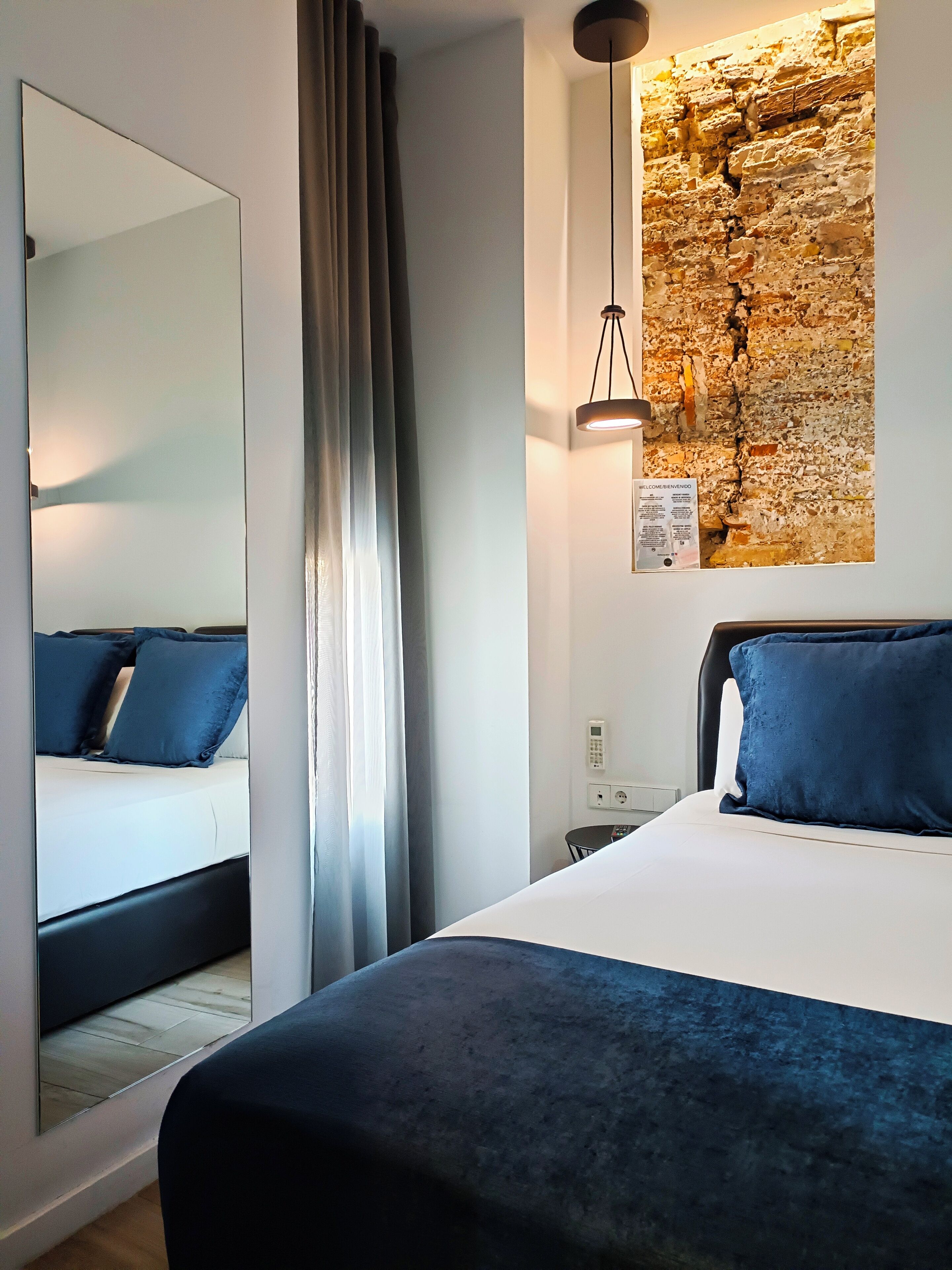 basic double room (interior) | 1 bedroom, down duvets, in-room safe, blackout curtains