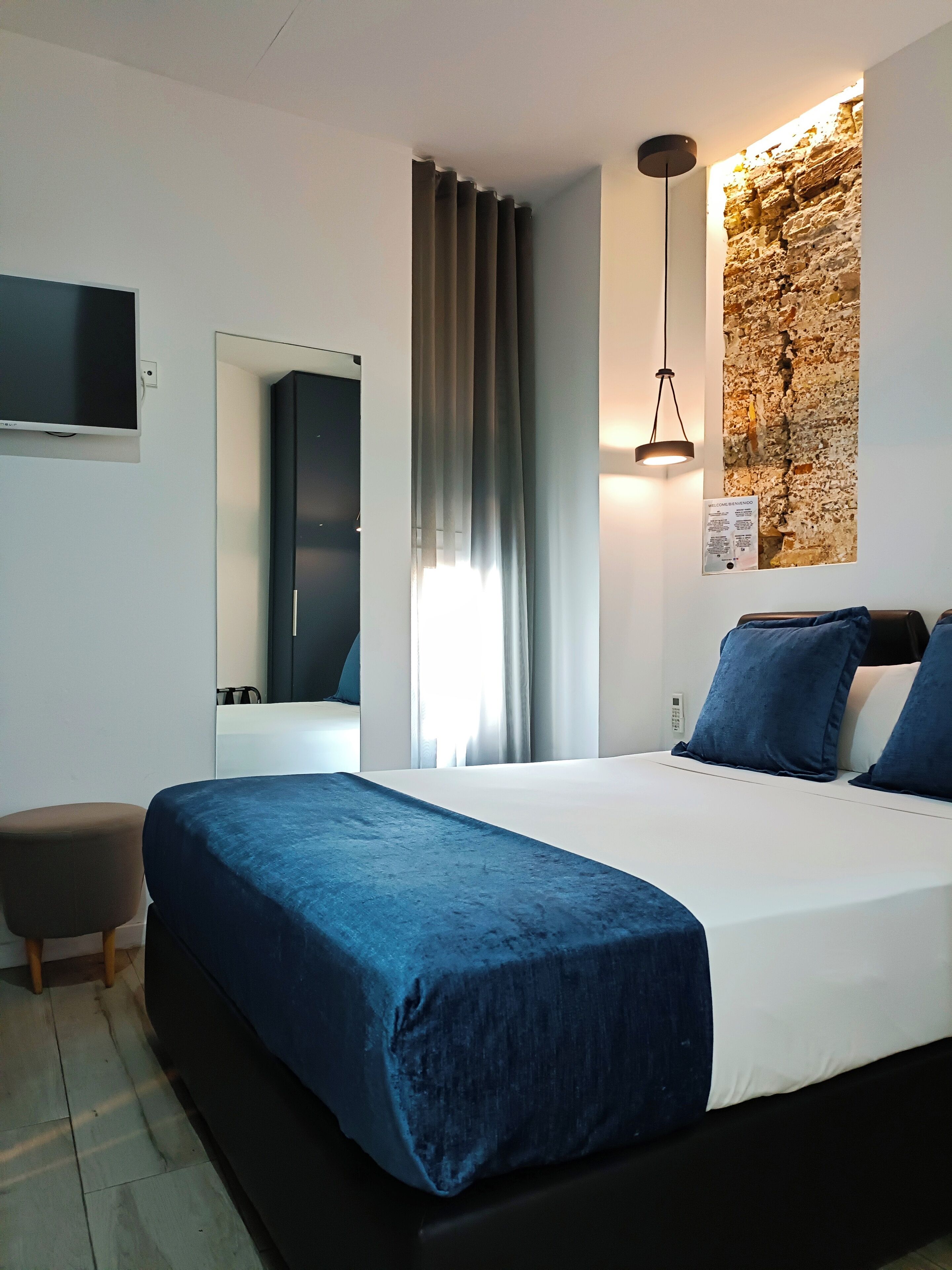 basic double room (interior) | 1 bedroom, down duvets, in-room safe, blackout curtains