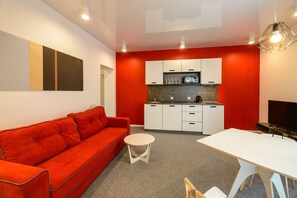 Apartamento panorâmico, 1 quarto, na torre | Sala de estar | TV LCD