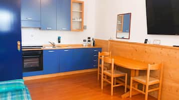 Family Apartment, 2 Bedrooms, Kitchenette, Mountain View (2 Adults + 2 Children) | Private kitchen | Full-size fridge, oven, stovetop, espresso maker