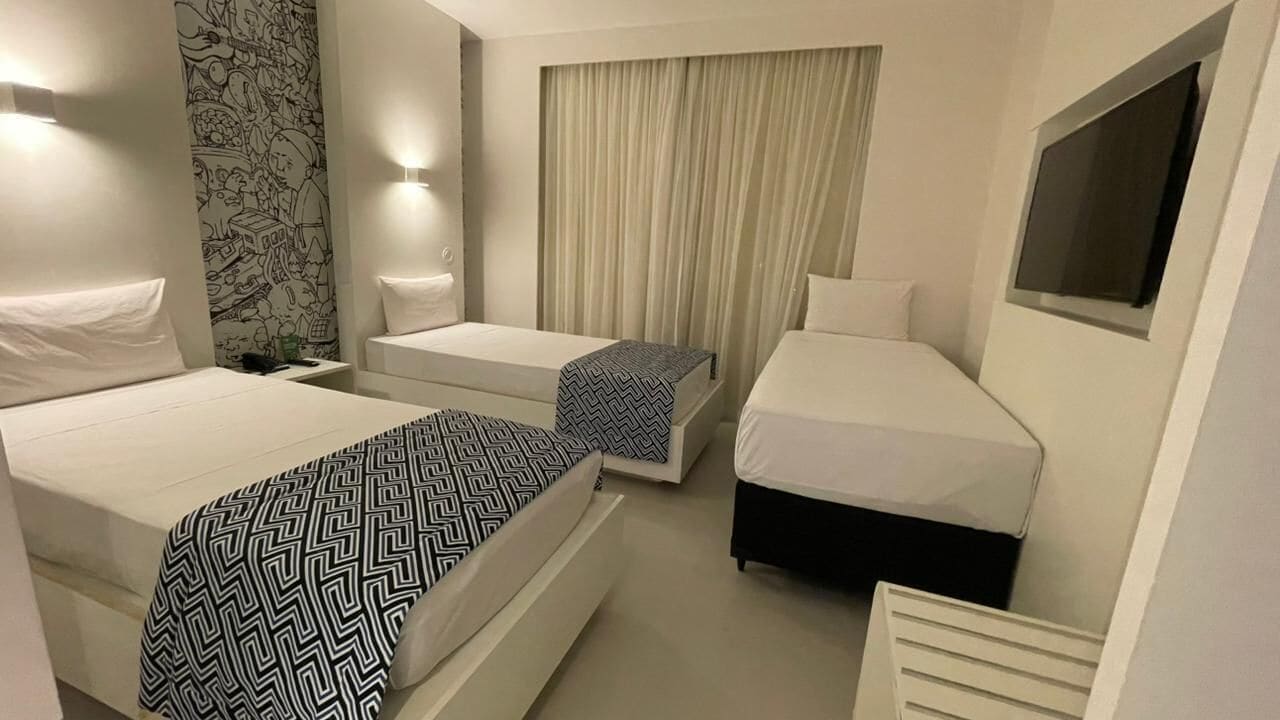 Standaard driepersoonskamer, 3 eenpersoonsbedden | Een minibar, verduisterende gordijnen, geluiddichte muren, gratis wifi