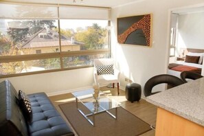 Apartment, 2 Bedrooms | Living area | Flat-screen TV - Apart Hotel Providencia (Santiago)