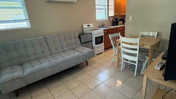 Classic Suite, Multiple Beds | Living area | 40-inch flat-screen TV with satellite channels, TV