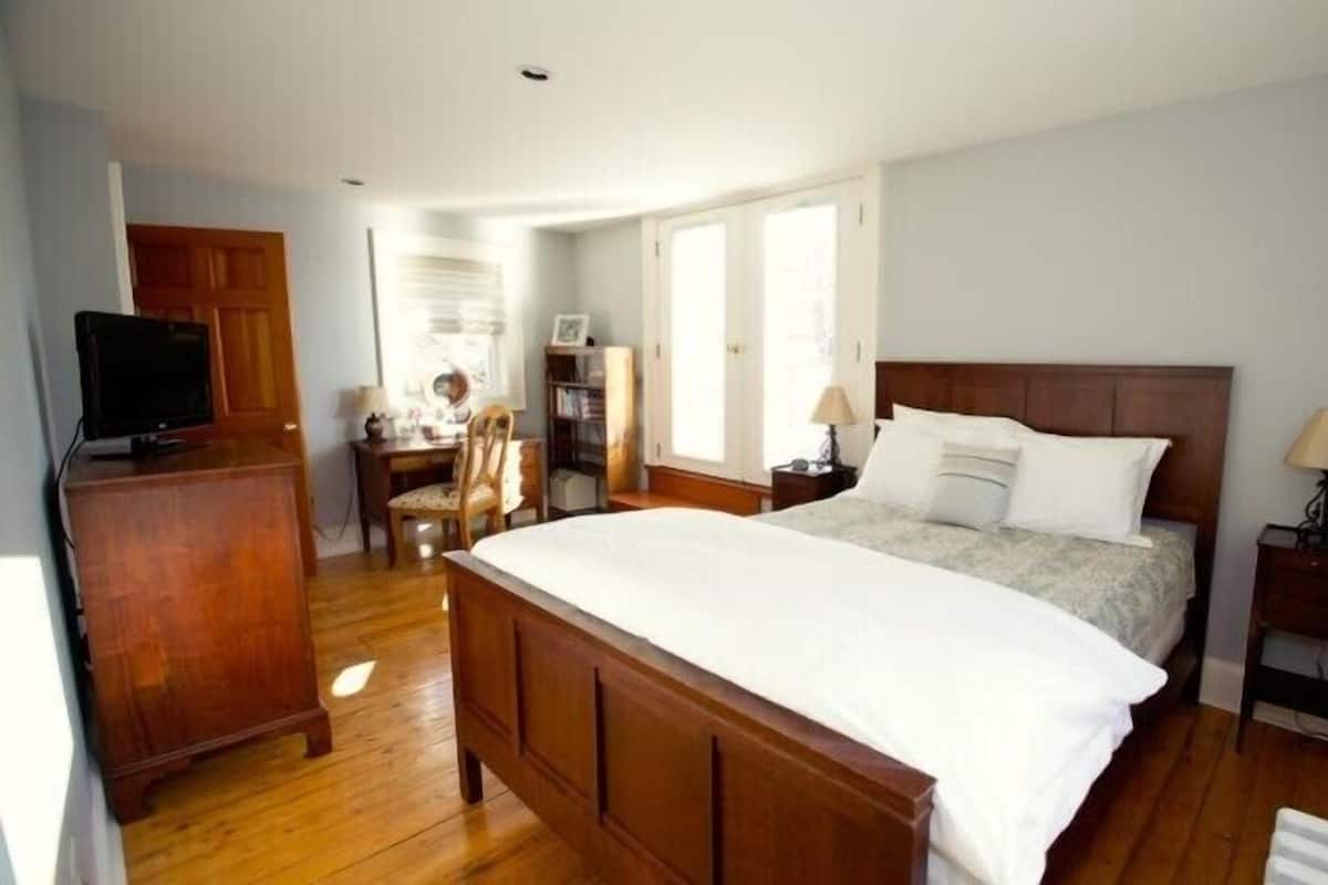 Ropa de cama de alta calidad y tabla de planchar con plancha