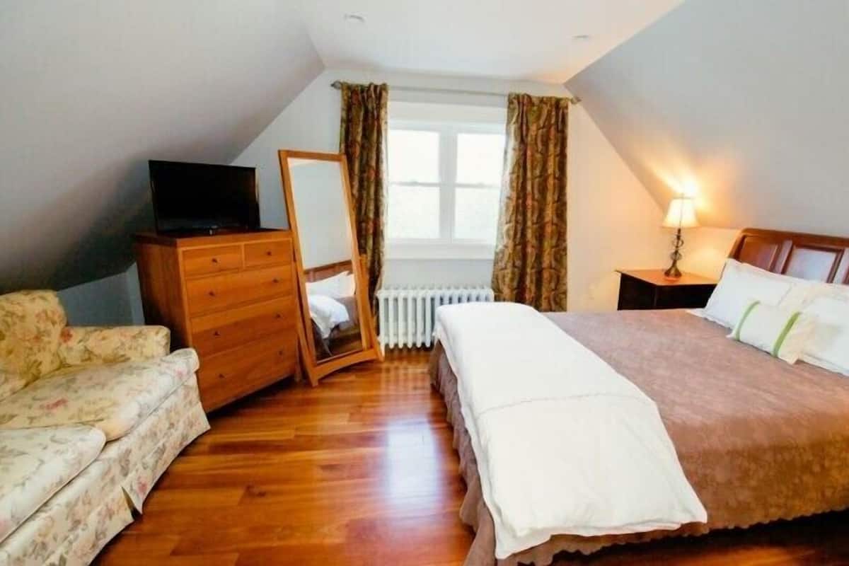 Ropa de cama de alta calidad y tabla de planchar con plancha
