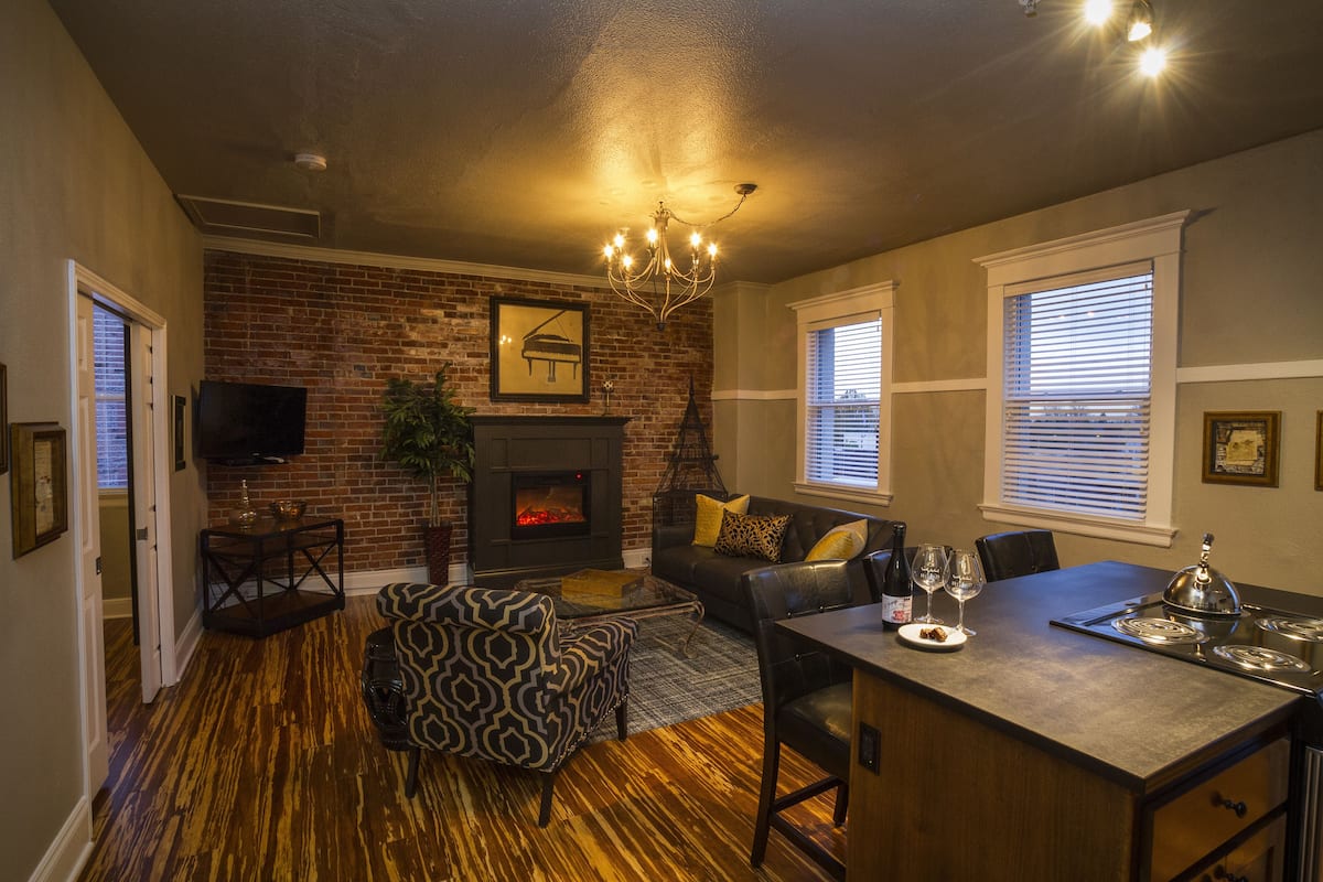 Elite Apartment, 1 King Bed, Non Smoking, Fireplace (11TH) | Living area | Flat-screen TV, fireplace