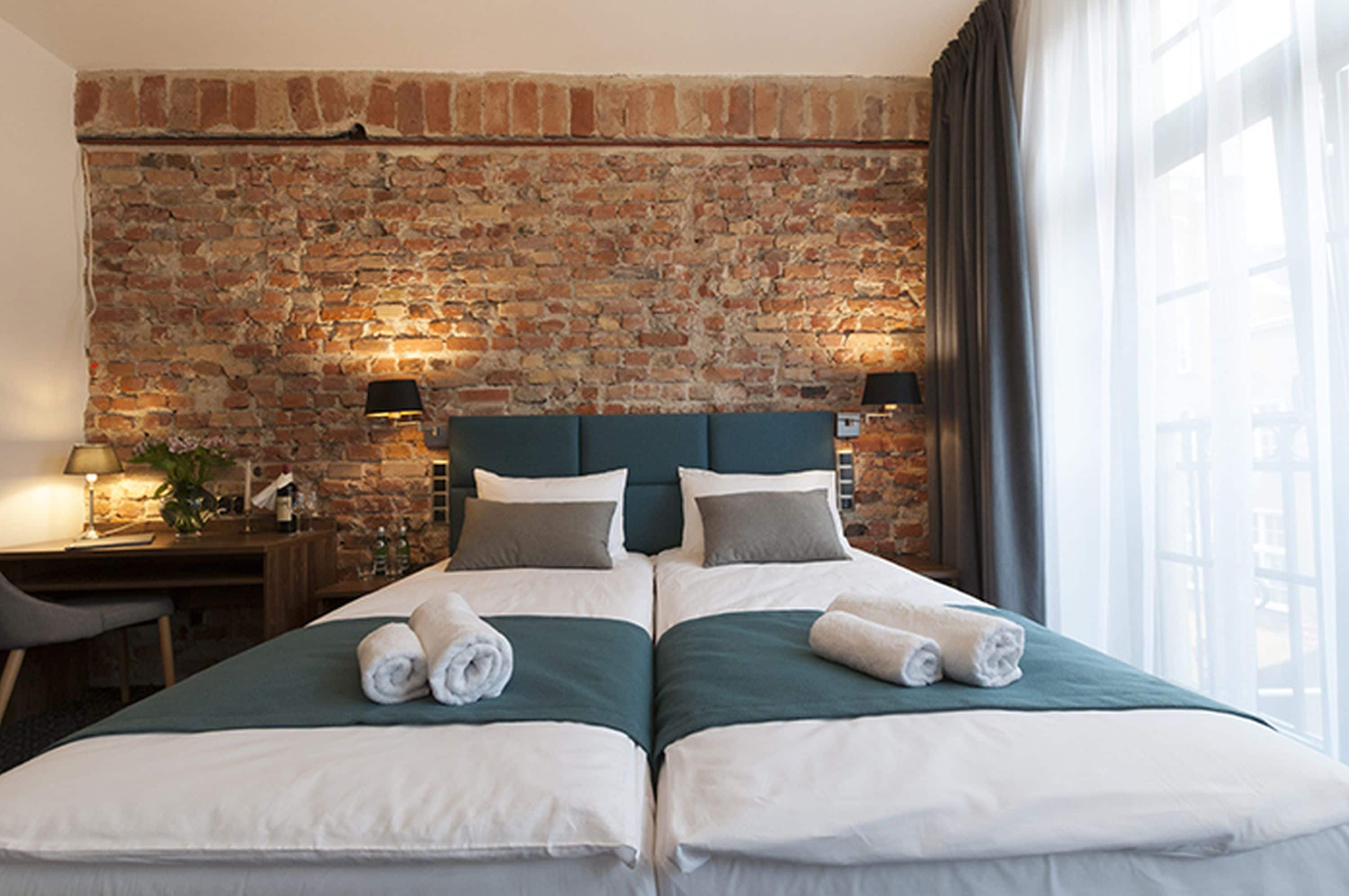 deluxe double or twin room | in-room safe, desk, blackout curtains, soundproofing