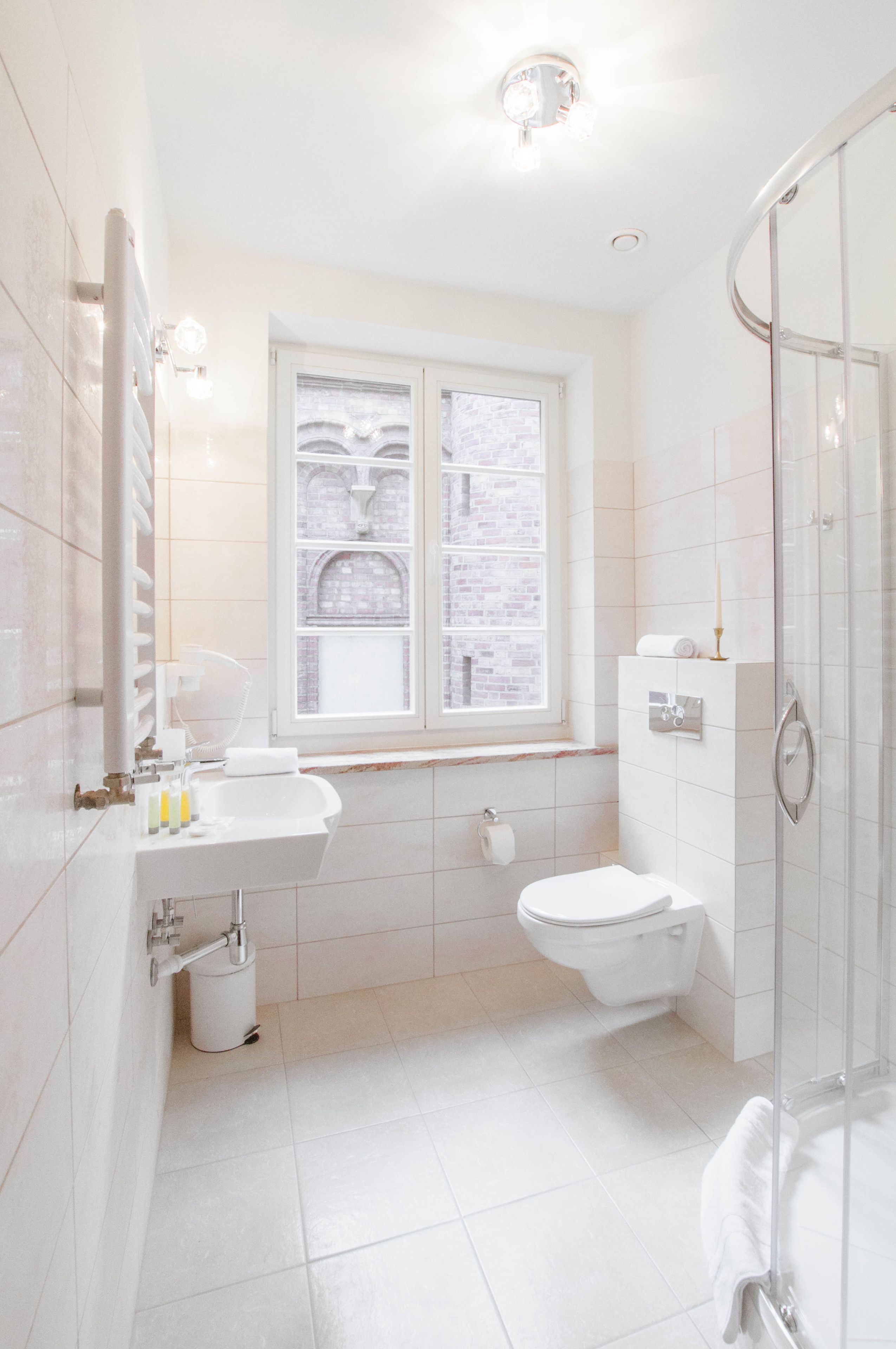 shower, free toiletries, hair dryer, slippers