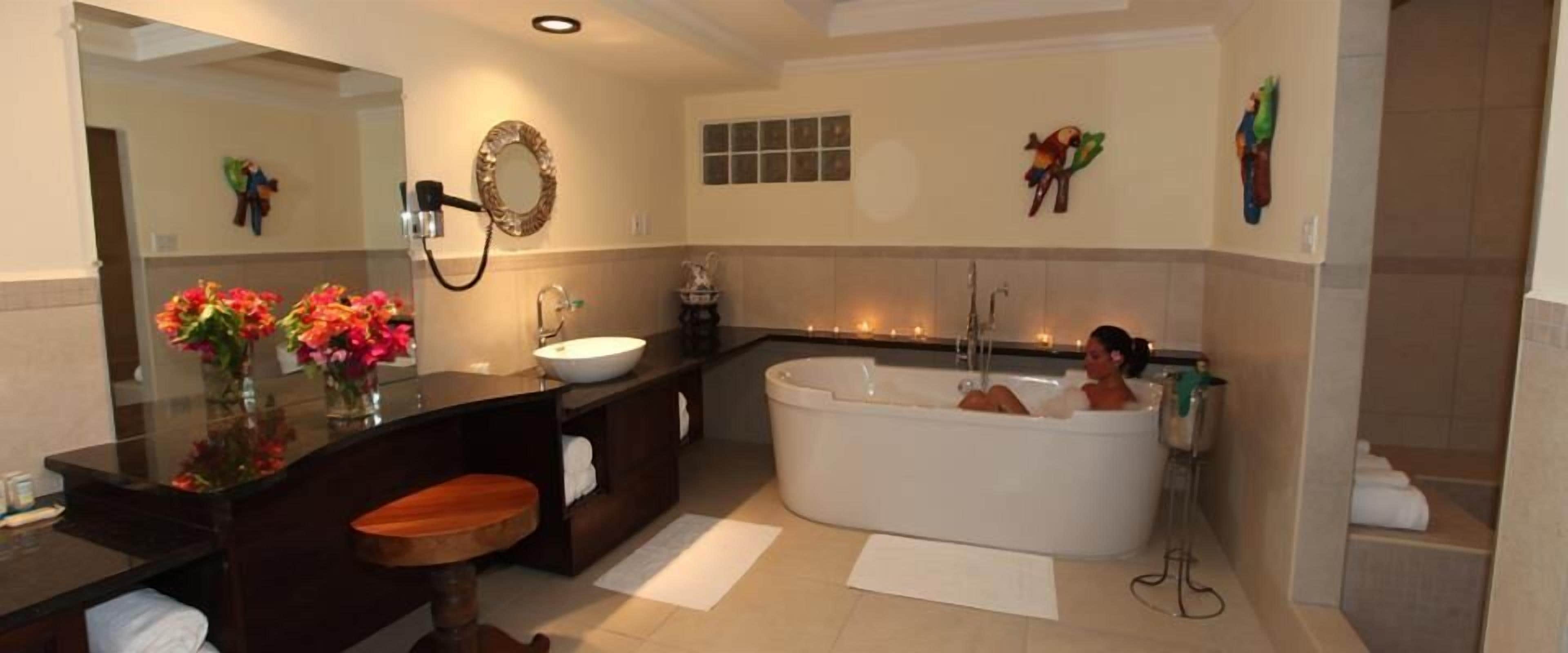 suite, beach view | bathroom | free toiletries, towels