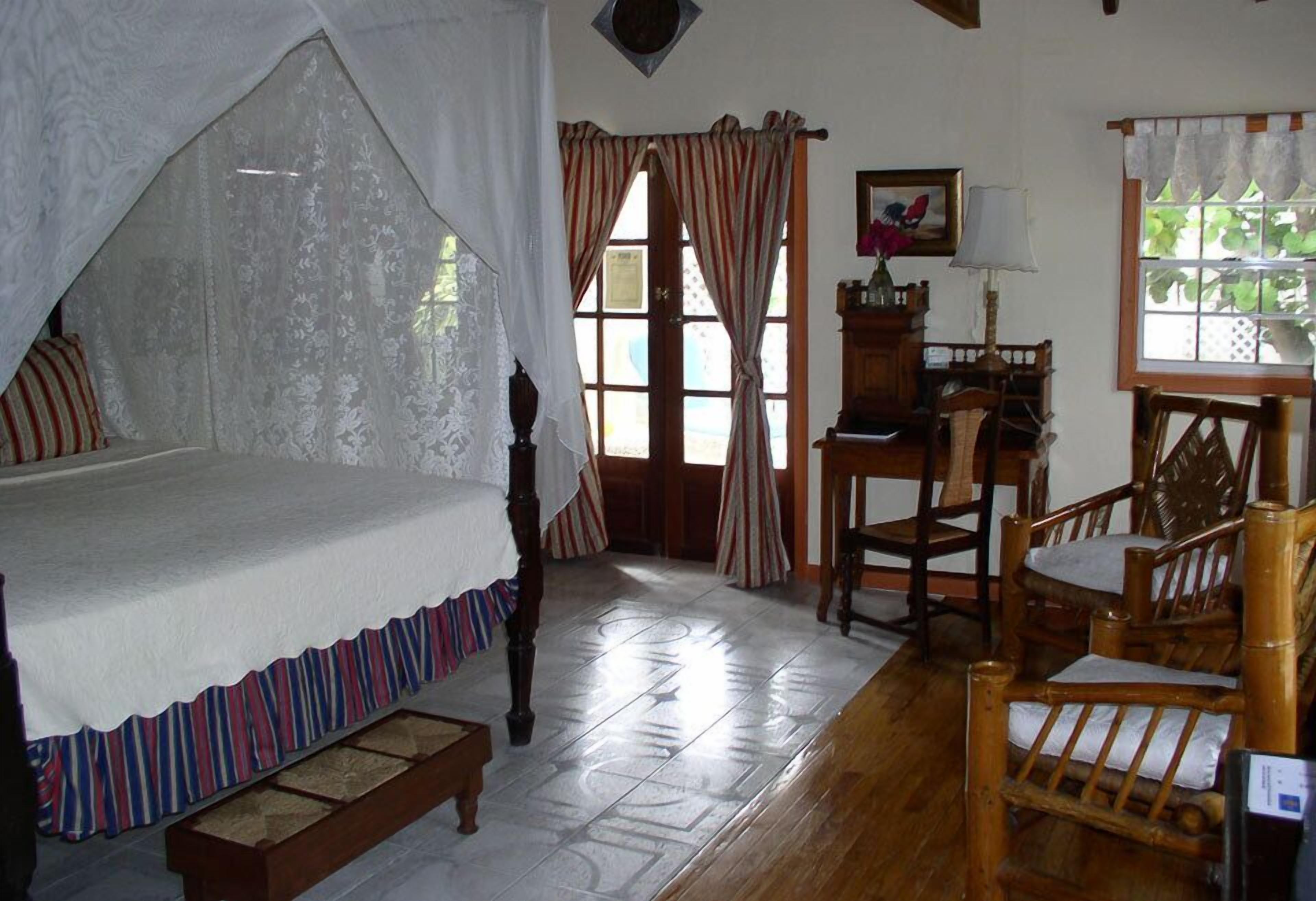 deluxe room, beachfront | premium bedding, in-room safe, individually decorated