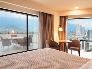 Superior Room, 1 King Bed, Accessible | Minibar, in-room safe, desk, iron/ironing board - MS Milenium Monterrey, Curio Collection by Hilton (San Pedro Garza García)