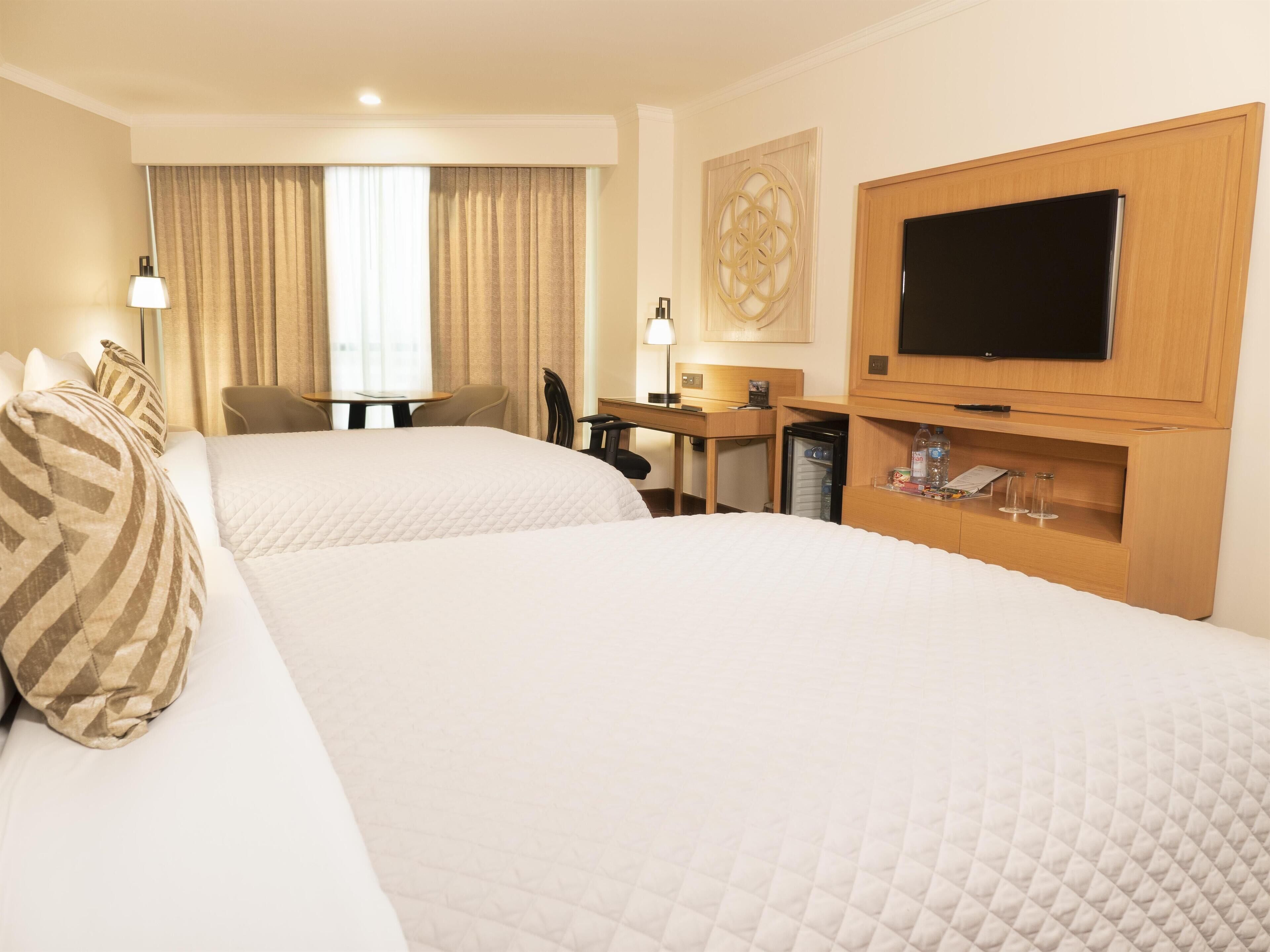 Room, 2 Double Beds | Minibar, in-room safe, desk, iron/ironing board