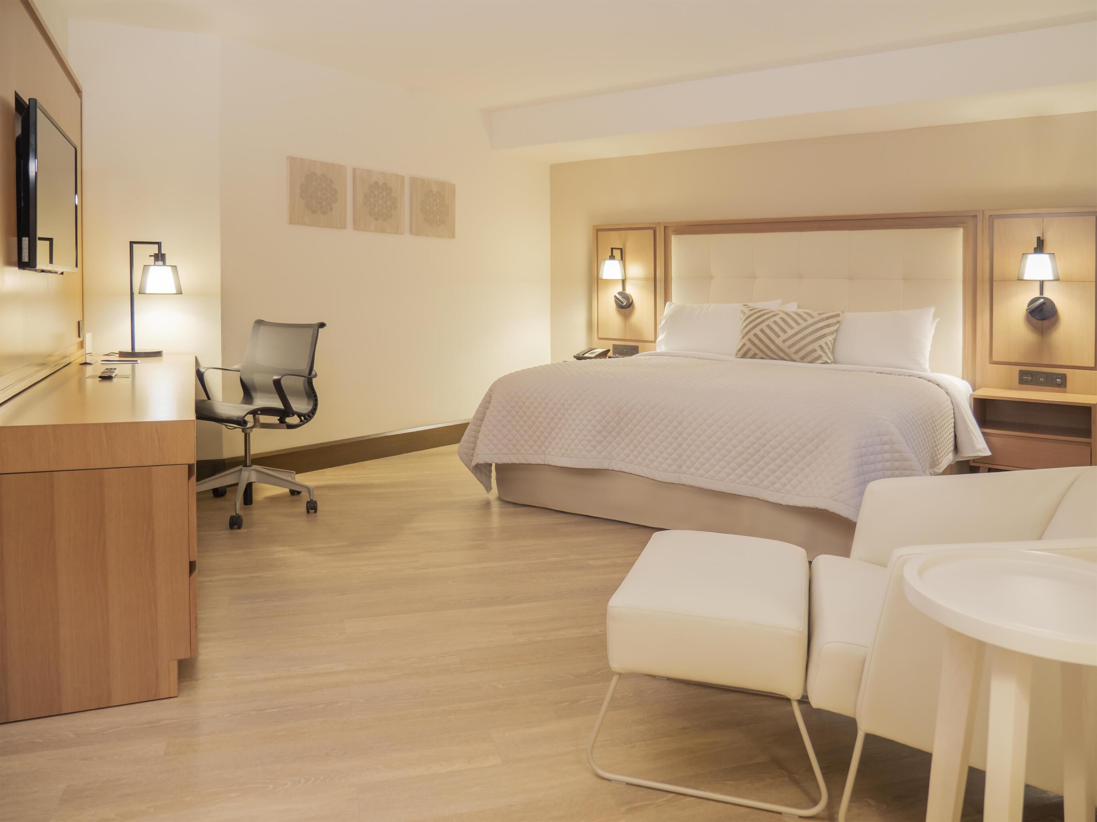 Junior Suite, 1 King Bed | Minibar, in-room safe, desk, iron/ironing board