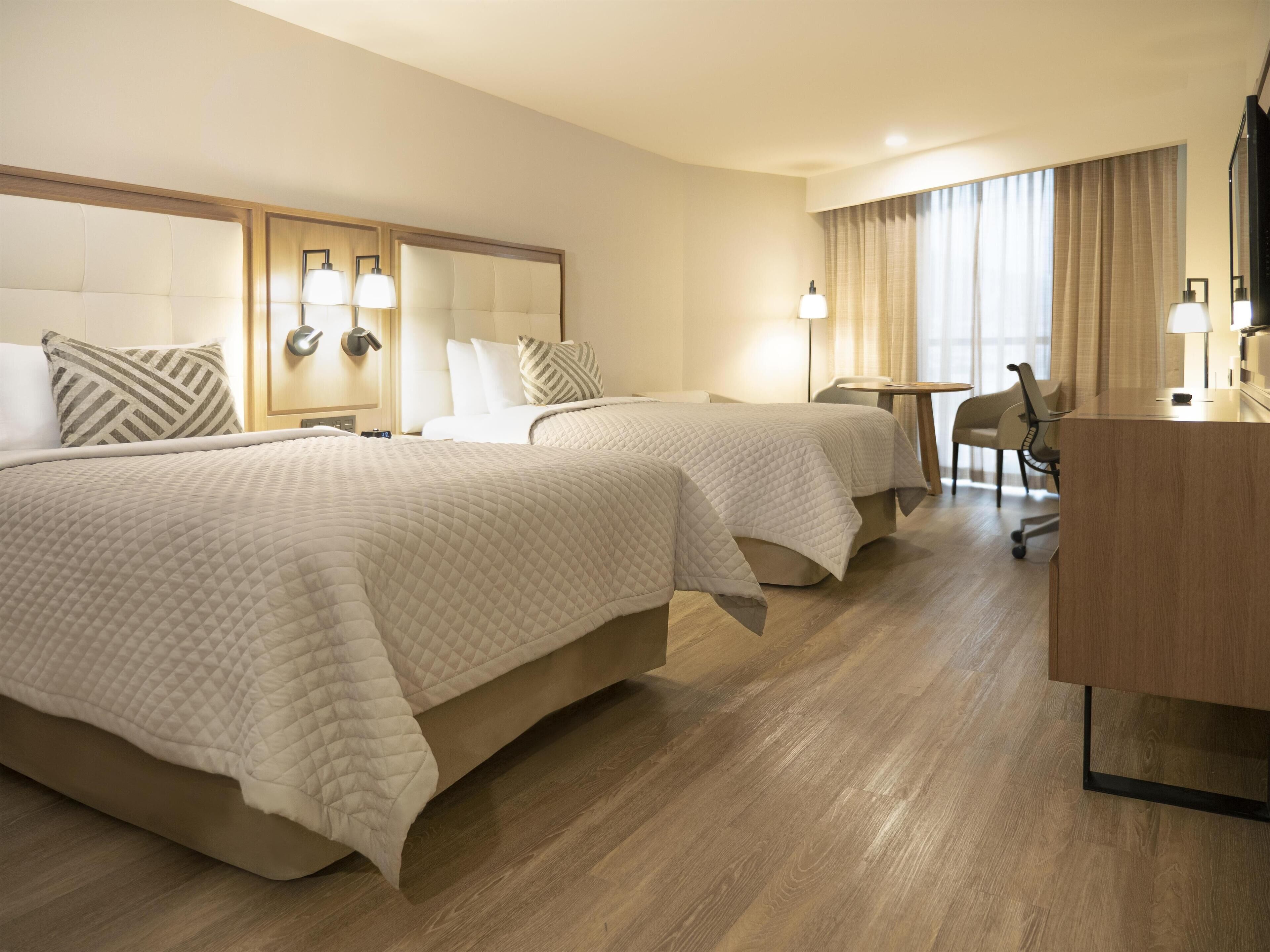 Junior Suite, 2 Double Beds | Minibar, in-room safe, desk, iron/ironing board