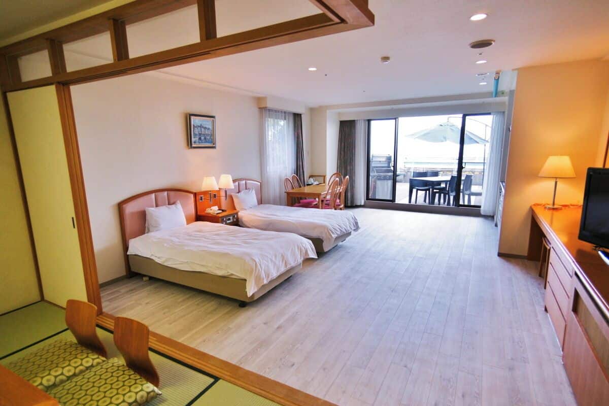 Deluxe kamer, niet-roken, uitzicht op oceaan (with terrace, Japanese-Western-Style) | 1 slaapkamer, beddengoed