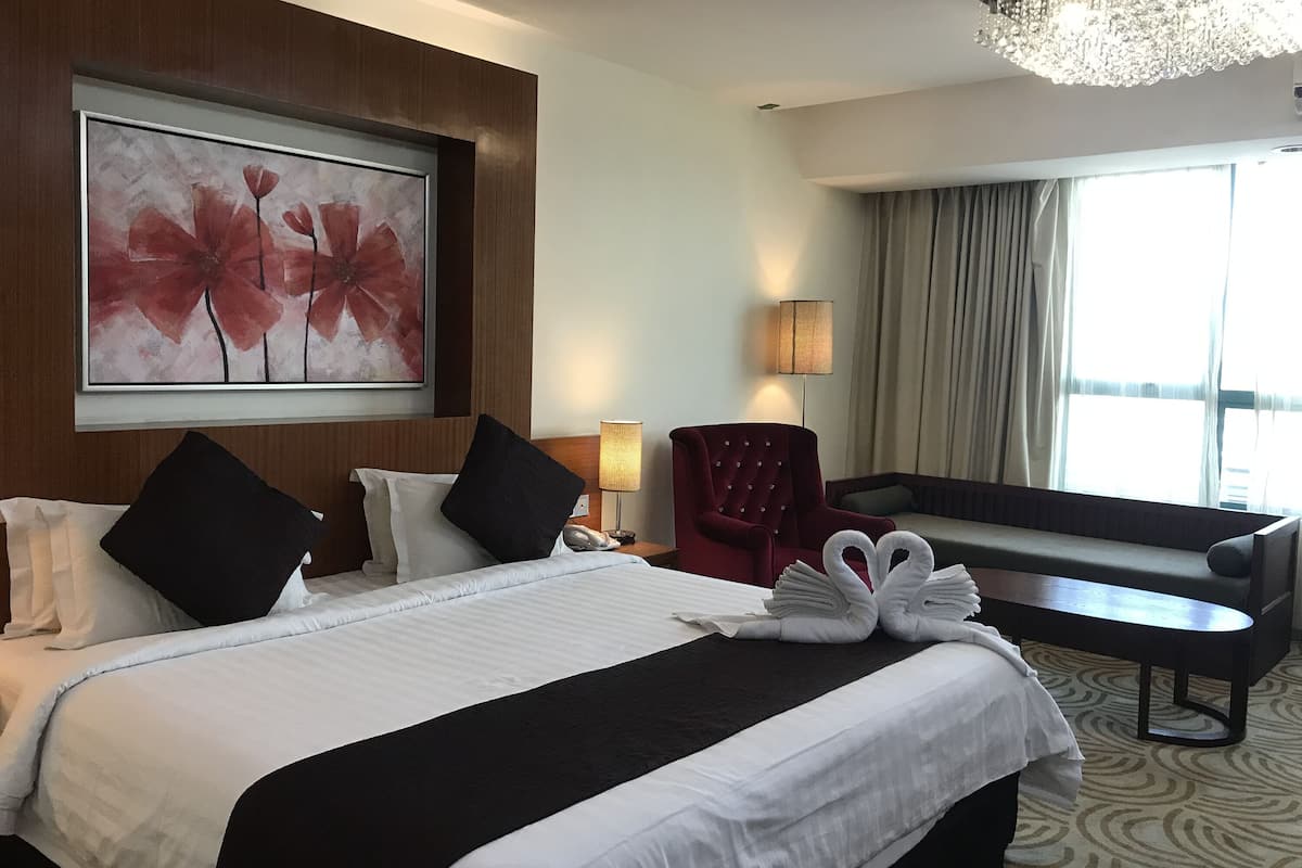 junior suite | minibar, in-room safe, desk, iron/ironing board