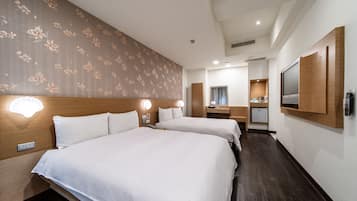 Premium bedding, desk, blackout drapes, soundproofing