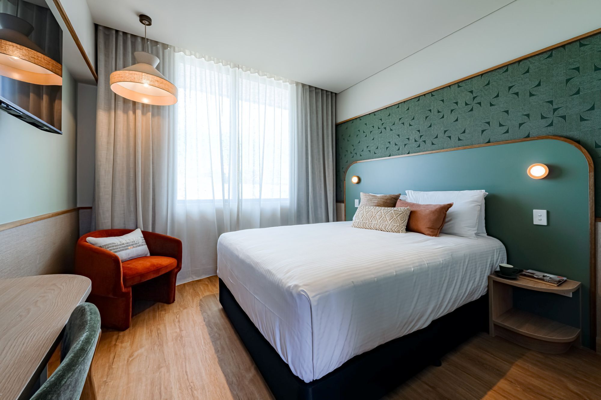 Premium bedding, down duvets, Tempur-Pedic beds, desk