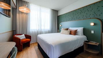 Premium bedding, down duvets, Tempur-Pedic beds, desk