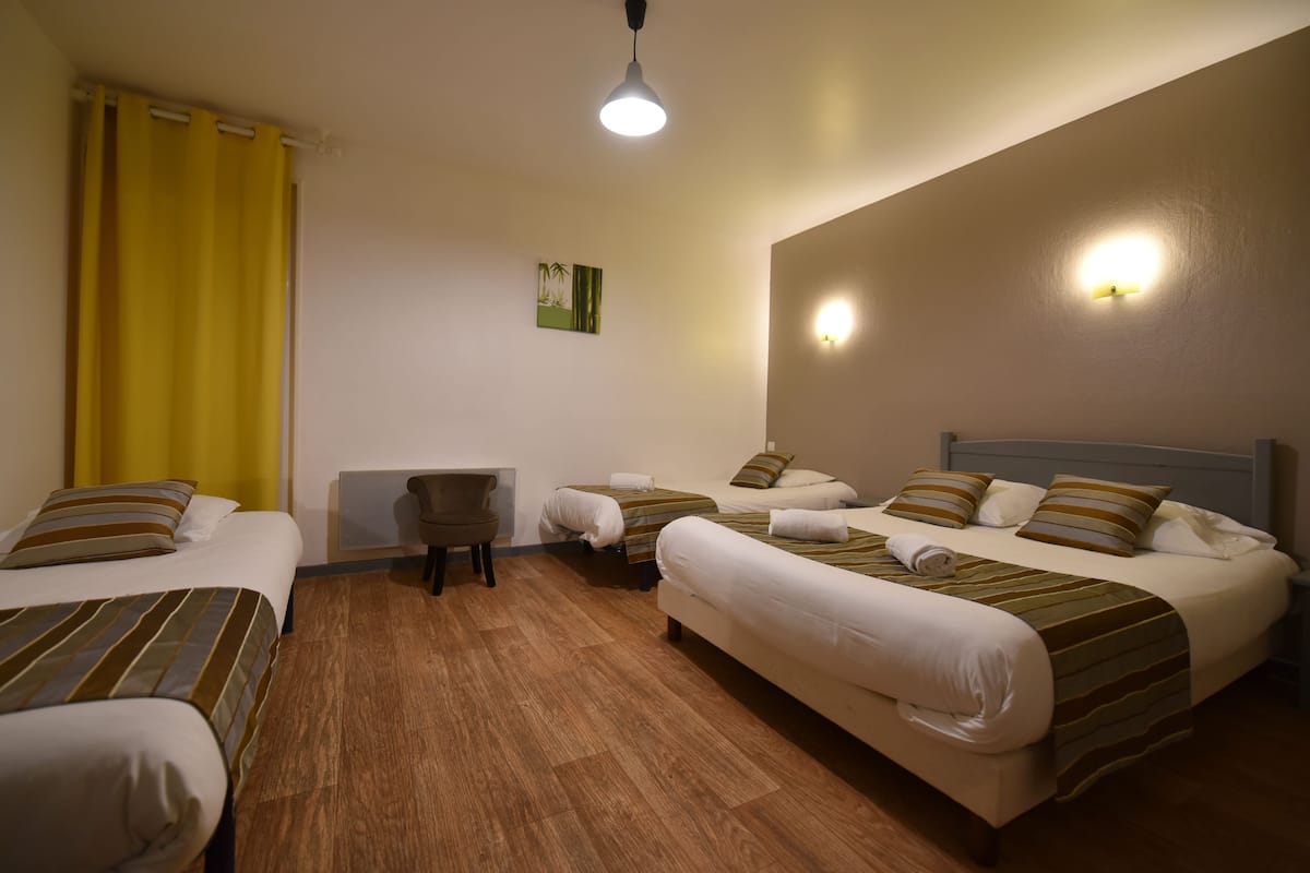 family quadruple room | 1 bedroom, in-room safe, desk, blackout curtains