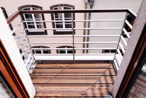 Habitación individual | Minibar, caja fuerte, decoración individual y mobiliario individual