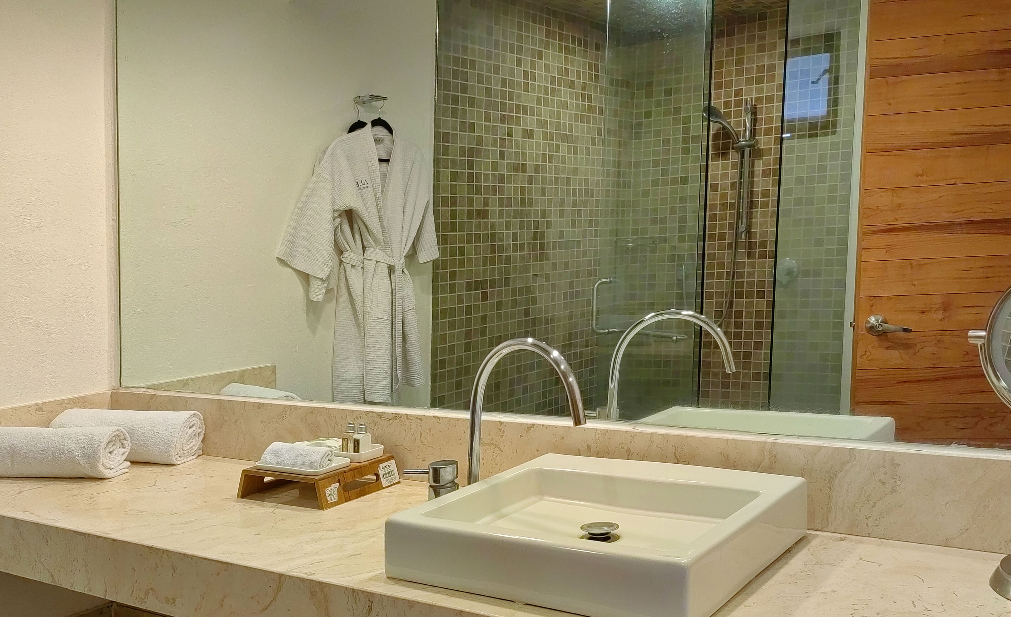 shower, designer toiletries, hair dryer, bathrobes