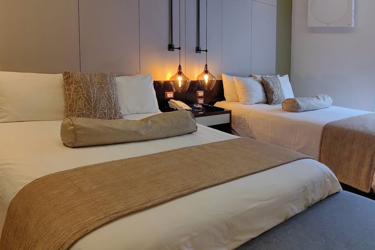 Premium bedding, down comforters, pillowtop beds, in-room safe
